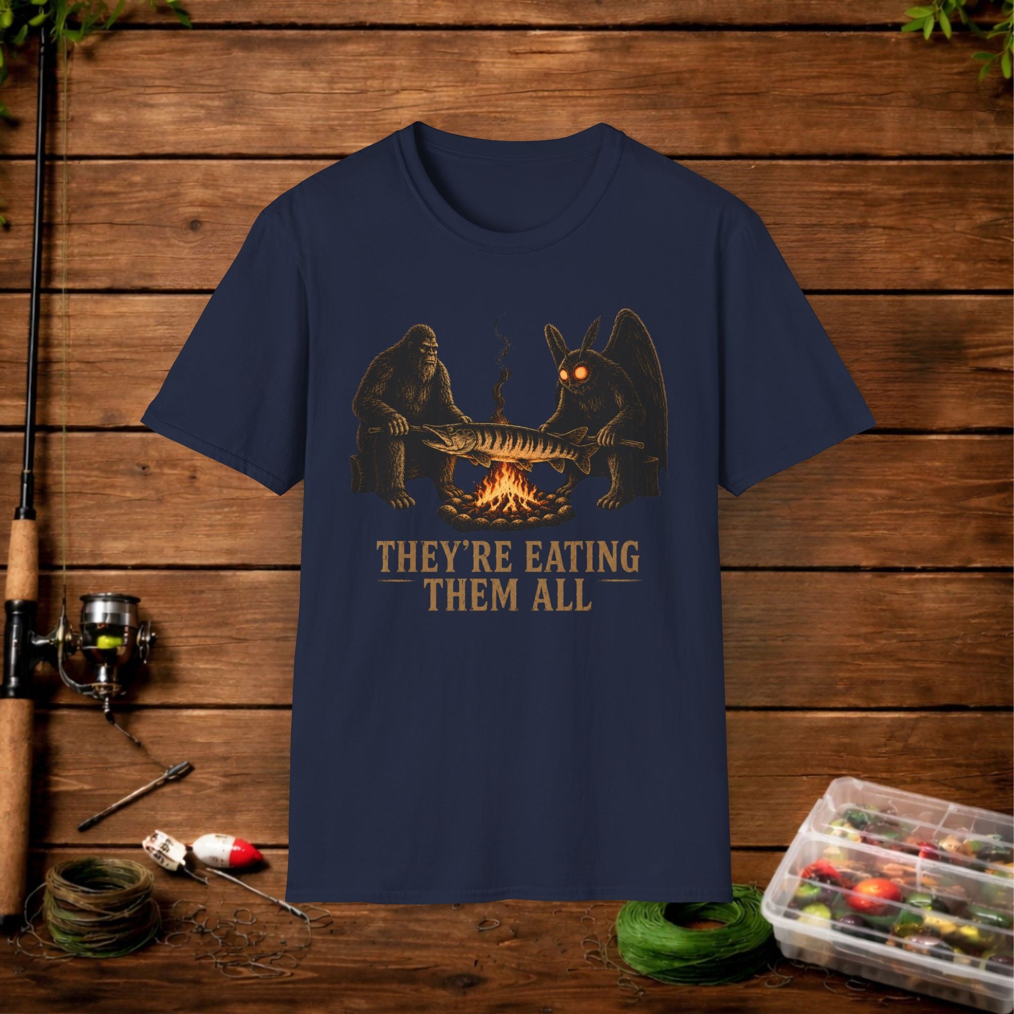 They're Eating Them All Fishing T-Shirt — Funny Campfire Monster Tee