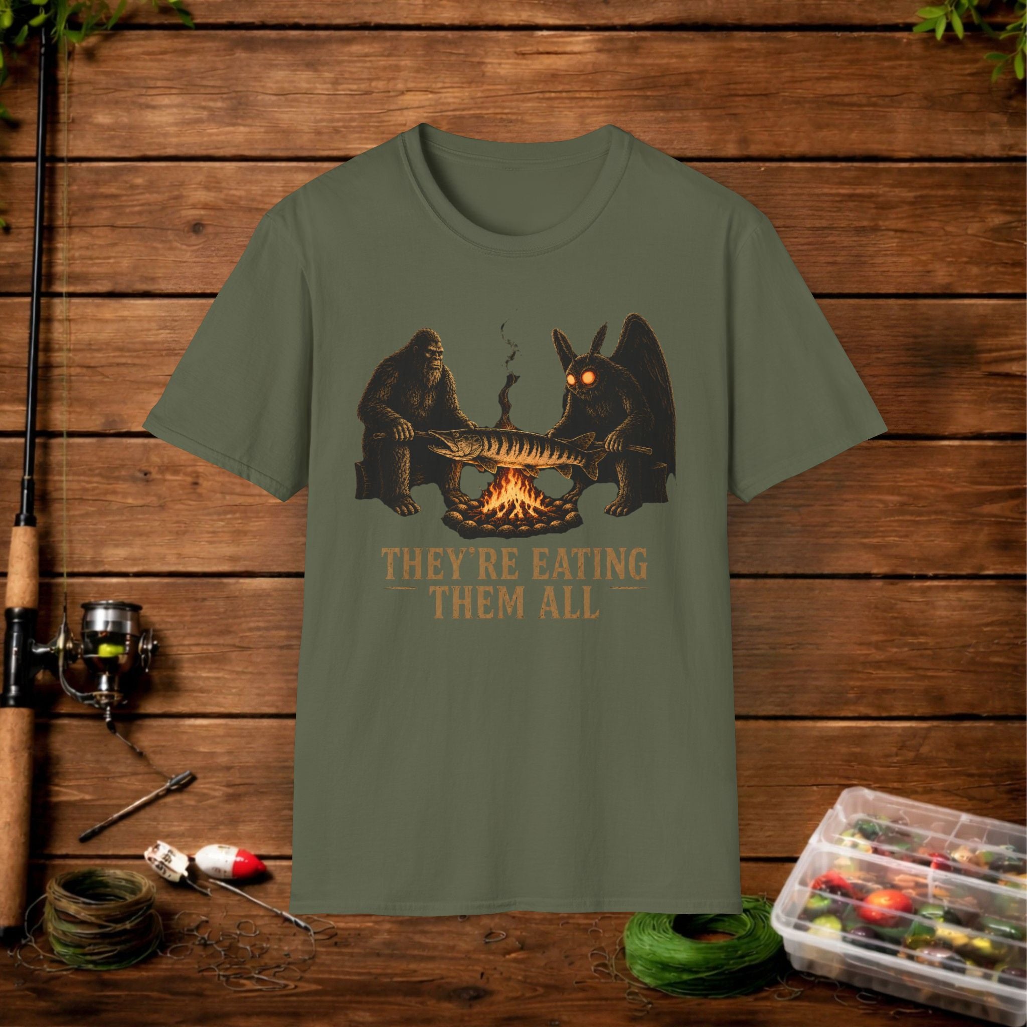 They're Eating Them All Fishing T-Shirt — Funny Campfire Monster Tee