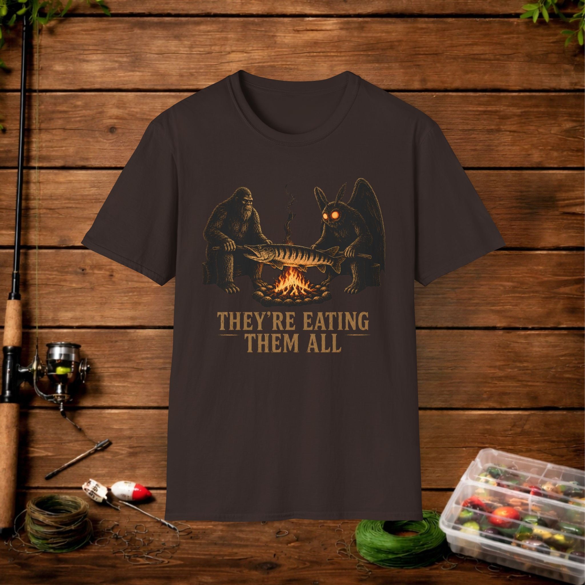 They're Eating Them All Fishing T-Shirt — Funny Campfire Monster Tee