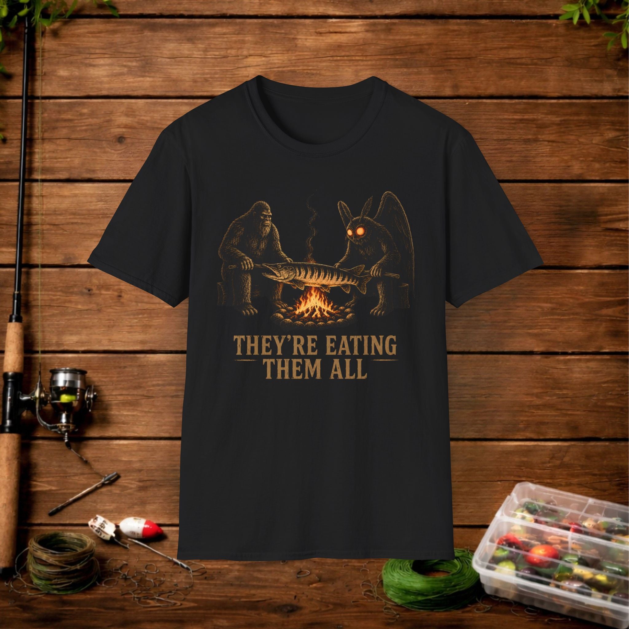 They're Eating Them All Fishing T-Shirt — Funny Campfire Monster Tee